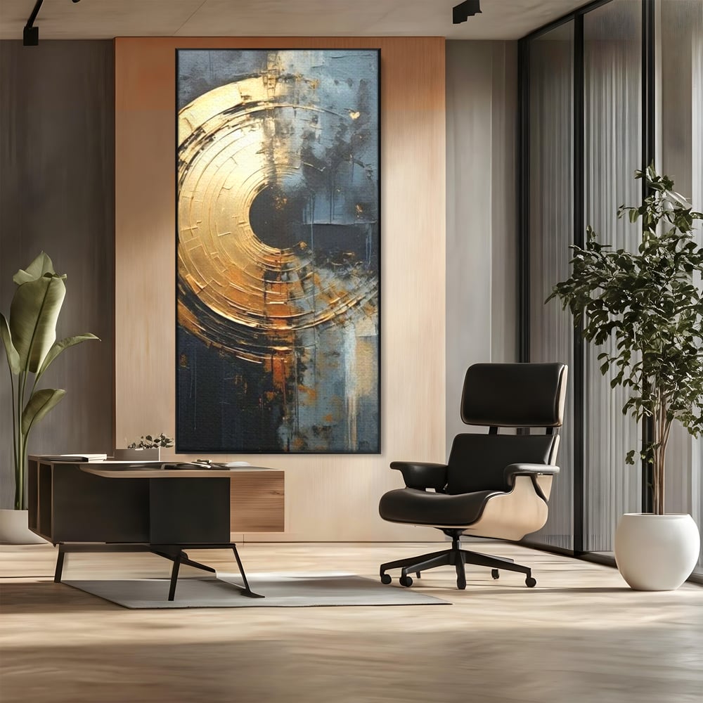 Tablou canvas cu tablou abstract cu cerc auriu, in rama de aluminiu negru, pe perete intr-un birou